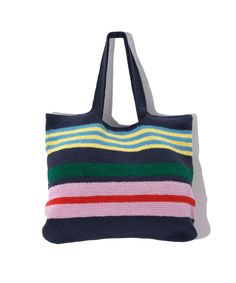 a multicolored striped tote bag on a white background