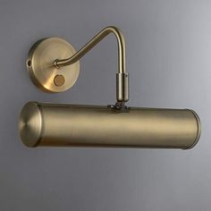 an image of a wall light that is in the shape of a tube or pipe