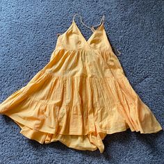 Never Worn Before Urban Outfitters V-neck Sundress For Summer, Urban Outfitters V-neck Beach Sundress, Urban Outfitters Ruffled Vacation Dress, Urban Outfitters V-neck Beach Dress, Urban Outfitters V-neck Mini Dress For Vacation, Urban Outfitters Cotton Sundress For Vacation, Urban Outfitters Ruffled Sundress For Beach, Chic Cotton Sundress By Urban Outfitters, Urban Outfitters Ruffled Dress For Vacation