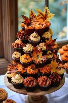 cupcakes are arranged in the shape of a tree