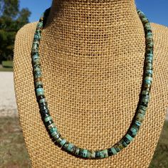 "Excellent quality! Genuine, natural green blue African heishi Turquoise gemstone and sterling silver necklace. These turquoise gemstones are NOT dyed. Bead size: 6mm - MEDIUM Lengths include 2\" extender chain. Example: 16\" + 2\" extender = 18\" total length to end of extender If you do not want extender - please send me a note MATCHING BRACELET: https://www.etsy.com/listing/881938238/4mm-african-turquoise-heishi-bracelet?ref=listing_published_alert All photos taken up close OUTDOORS in natura Single Strand Turquoise Chrysocolla Necklace, Rondelle Turquoise Necklace With Natural Stones As Gift, Turquoise Rondelle Necklace With Natural Stones For Gifts, Turquoise Chrysocolla Necklace With Round Beads As Gift, Gift Turquoise Emerald Necklace With Polished Beads, Southwestern Turquoise Chrysocolla Necklace, Southwestern Style Turquoise Chrysocolla Necklace Gift, Southwestern Chrysocolla Turquoise Necklace Gift, Turquoise Rondelle Necklace For Gift