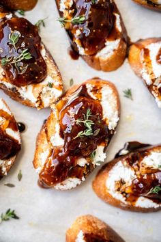 several pieces of bread with meat and cheese on them