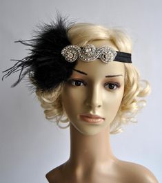 Beautiful Vintage Style, Great Gatsby inspired design - flapper rhinestone headband with feathers. Perfect for a vintage inspired bride, or a 1920's wedding or Great Gatsby party. Lovely black elastic haedband embellished with large sparking Art Deco rhinestone applique. A spray of white light marabou feathers and wispy ostrich plumes looks from behind the rhinestone piece. Old Hollywood glam. Can be worn with feathers on the right ot left side of head, the ribbon is elastic so it fits everybody Great Gatsby Headpiece, 1920s Headband, Gatsby Headpiece, Flapper Headpiece, Gatsby Headband, 1920s Headpiece, Vintage Headpiece, Flapper Headband