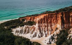 an aerial view of the beach and cliffs