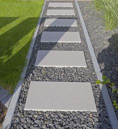 a walkway made out of stones with grass in the background and text overlay that reads,