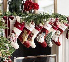 christmas stockings hanging from the fireplace mantel