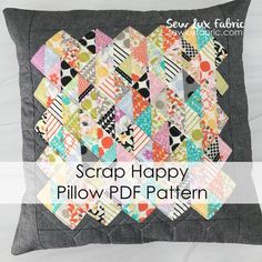 a pillow with the words scrap happy pillow df pattern on it