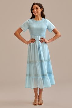 Modest Smocked Midi Dress, Modest Smocked Midi-length Dress, Modest Smocked Dress For Daywear, Fitted Modest Smocked Dress With Smocked Cuffs, Modest Fitted Smocked Dress, Fitted Modest Smocked Dress, Daywear Smocked Dress With Short Sleeves And Gathered Waist, Modest Smocked Dress With Smocked Cuffs For Summer, Modest Fitted Smocked Summer Dress