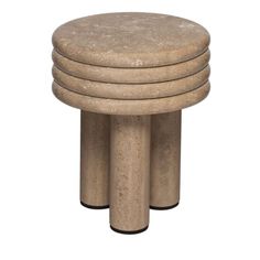 four stone stools stacked on top of each other in the shape of three circles