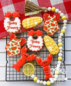 some decorated cookies are on a cooling rack