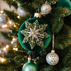 a christmas tree with ornaments hanging from it