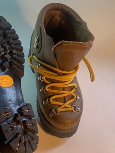 In amazing like new condition, these vintage Italian hiking boots are well built and made to last a lifetime. Italian made by Gaerne circa 1970's with Vibram Montagna souls and new original high durability laces, these Edge classics are sure to endure not to mention impress! Vintage Lace-up Boots For Outdoor Activities, Rugged Waterproof Boots With Round Toe For Climbing, Rugged Leather Climbing Boots, Vintage Leather Boots For Outdoor Activities, Climbing Boots With Vibram Sole And Round Toe, Rugged Round Toe Climbing Boots, Vintage Work Boots With Rubber Sole For Outdoor, Vintage Work Boots With Rubber Sole, Vintage High-top Boots With Vibram Sole