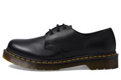 PRICES MAY VARY. The iconic construction of the Dr. Martens 1461 Core shoe lets you express your personal style! Virginia leather upper is a soft, supple leather that breaks in easily and ages beautifully. Traditional lace-up system with fabric laces and tonal eyelets for a sturdy fit. Goodyear welt construction where the upper and sole are heat-sealed and sewn together with the classic Z-welt stitching for long-lasting durability and flexibility. Comfortable leather lining. The iconic construct Half Shoes, Dr Martens Womens, Aging Beautifully, Goodyear Welt, Virginia, Personal Style, Leather Upper, Oxford, Long Lasting