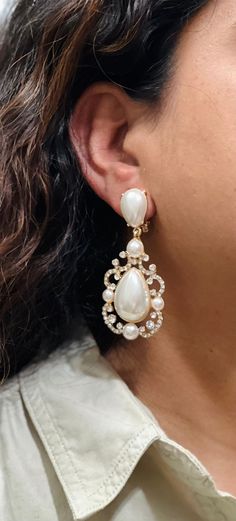 "Dive into the timeless elegance of Kundan Jhumka/Jhumki and Diamond earrings, reflecting the rich heritage of Indian and Pakistani Jewelry, adorned with the glamour of Bollywood. Discover your perfect pair ✨💎. Explore an array of designs and varieties by visiting my Etsy shop for an extensive collection 🛍️:    https://thefashionofindia.etsy.com"earrings bridal earrings Bollywood statement jewelry Pearl Clip-on Drop Earrings, Clip-on Pearl Drop Earrings, Clip-on Drop Pearl Earrings, Clip-on Dangle Pearl Earrings, Bridal List, No Piercing Earrings, Earrings No Piercing, Kundan Jhumka, Piercing Earrings