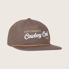 Inspired by the cattle industry, this pebble brown vintage style rope snapback hat offers a perfect blend of traditional and contemporary design. The adjustable snapback ensures the perfect fit while the 100% cotton ripstop material ensures longevity. Adorned with an embroidered design, Cowboy Cool woven label, and PVC icon tag, this hat captures the essence of the Western lifestyle. Color: Pebble Adjustable Snapback Flat Bill - Easily Curved 5 Panel Semi-Structured Contrasting Polyester Rope Co Suede Hat, Flat Bill Hats, Western Lifestyle, Western Hats, Embroidered Hats, Woven Label, Woven Labels, Girls Wear, Embroidered Design