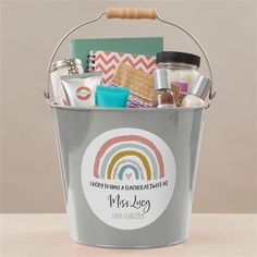 a bucket filled with personal care items on top of a table