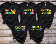 three matching shirts with the words super mom and baby, both printed in rainbow colors