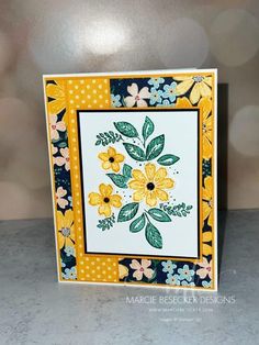 a card with yellow and green flowers on it