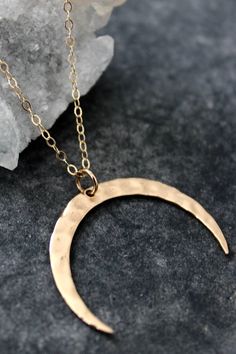 Medium Gold Hammered Crescent Moon Necklace -Gold plated 1”x 1” hammered crescent pendant on simple gold chain. -Measures 20” Long -Made in the USA Gold Hammered Half Moon Jewelry, Hammered Gold Half Moon Jewelry, Minimalist Hammered Crescent Jewelry, Minimalist Crescent Hammered Jewelry, Hammered Crescent Jewelry, Cresent Moon Necklace, Simple Gold Chain, Moon Necklace Gold, Crescent Pendant