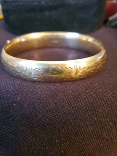 "This is a Wonderful gold filled bangle bracelet 12KT gold FILLED Bracelet Measures inside 2 1/2\" X 1/2\" wide condition is excellent antique please see pics Will combine shipping" Antique Etched Gold Bangle Bracelet, Antique Etched Gold Bracelets, Antique Etched Gold Bracelet, Victorian 14k Gold Bangle Bracelet, Antique Gold Hinged Cuff Bracelet, Victorian Gold Bangle Cuff Bracelet, Antique 14k Gold Bangle Bracelet, Antique Hinged Yellow Gold Bracelet, Antique 14k Gold Bangle