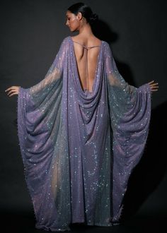 Embellished Sharp v-neck kaftan in double shade of lilac and silver. Luxury Dresses With Motifs For Festivals, Luxury Art Silk Dresses For Festivals, Traditional Luxury Festival Dresses, Luxury Festive Dresses With Unique Design, Luxury Costume Floor-length Evening Dress, Luxury Silk Traditional Evening Wear, Luxury Long Dress For Festivals, Luxury Cutdana Party Dresses, Luxury Draped Prom Gown