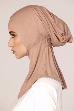 This full coverage undercap is perfect for wearing underneath any sheer or see through hijabs to completely cover your chest, neck and hair. These full coverage undercaps are ultra comfortable and perfect for everyday wear. Made with our premium quality jersey material. Contents: 95% Cotton/5% Spandex Lightweight Stretch Solid Color Tops, Lightweight Fitted Top, Versatile Stretch Solid Hijab, Casual Stretch Hijab In Solid Color, Casual Stretch Solid Color Hijab, Versatile Lightweight Stretch Tops, Versatile Stretch Lightweight Tops, Versatile Lightweight Solid Tops, Casual Solid Color One-size Headscarf