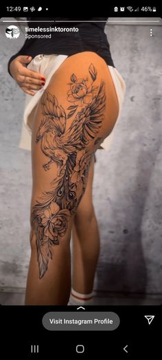 the back of a woman's thigh with tattoos on it