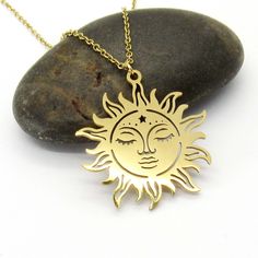 "Gold Plated Stainless Steel Sun Face Pendant, Gold Link Chain with Extension, Women's Necklace, Celestial Pendant Jewelry, Gift for Women, Boho Jewelry, Men's Necklace Material: 304 Gold Plated Stainless Steel Pendant and Link Chain with lobster clap closure Dimensions: Pendant 1¼\" high x 1¼\" wide (approx), 17\" Chain  This piece includes a 17\" stainless steel gold plated chain A custom chain length is available. MORE NECKLACES AT: https://jdsfashionjewelry.patternbyetsy.com/shop/45831044/womens-necklaces VISIT MY SHOP AT: https://www.etsy.com/shop/JDsFashionJewelry PATTERN SHOP: https://jdsfashionjewelry.com This Stainless Steel Pendant and Chain is a durable alternative to Sterling Silver, hypo allergenic and resists tarnishing while maintaining an attractive finish." Metal Sun Design Necklace As Gift, Gold Sun Design Necklace In Metal, Celestial Pendant, Custom Chain, Pentagram Necklace, Stainless Steel Cross Pendant, Face Pendant, Women's Necklace, Sun Face