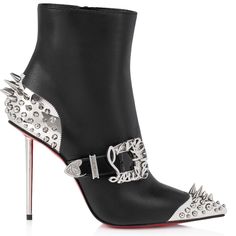 Step into luxury with the Womenphis Pic Booty ankle boots in sleek black nappa leather. These limited edition Louboutin boots blend Wild West inspiration with high fashion, featuring a 100 mm stiletto heel and signature metal spikes. Perfect for making a statement. #Louboutin #LuxuryFashion #BlackBoots Louboutin Boots