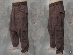 "~ one of the most comfortable pants styles ~ with belt-buckle closure ~ front pockets ~ backside pockets ~ thigh pockets at the front ~ knee cargo side pockets + 2 extra small zipper pockets ~ adjustable with bands at the end of the leg ~ made from 100% cotton canvas Photos: 1. light Brown 2. Black 3. dark Green 4. dark Brown 5. White 6. Olive 7. Green 8. Camouflage 9. Brown 10. Choco 11. Navy \"my color choice\" Check for more colors below the link https://www.etsy.com/listing/113548567/color- Baggy Harem Cargo Pants, Baggy Parachute Pants With Pockets For Festivals, Baggy Festival Pants With Pockets, Baggy Pants With Pockets For Festival, Brown Harem Pants With Pockets, Canvas Photos, Harem Trousers, Comfortable Pants, Pants Cargo