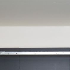 a black and white photo of an oven with the door open to show it's cooking area