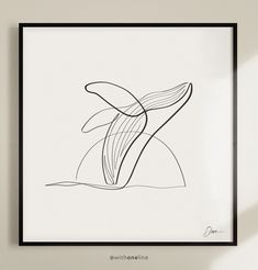 a black and white drawing of a whale's tail is shown in the frame