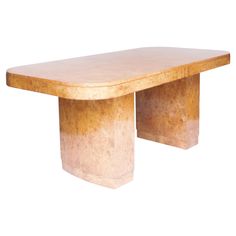 a wooden table sitting on top of a white wall