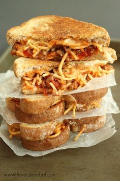 three sandwiches stacked on top of each other