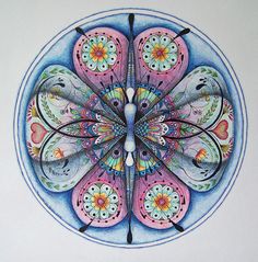 a painting of a colorful butterfly on a white background with blue and pink circles around it