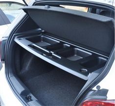 the back end of a car with its trunk open