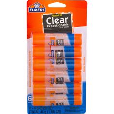 four orange and blue eraser pens in packaging on a white background with the words clear