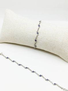 Evil Eye tennis bracelet is adjustable, this zig Zag bracelet comfortably fits on any wrist. Lenght of the Cz bracelet is 20 cm (7.87 inches) For more evil eye bracelets, click the link below; https://www.etsy.com/shop/EyeDesignsbyGG?ref=search_shop_redirect&section_id=30219689 Adjustable Silver Crystal Bracelet Hand Set, Adjustable Hand Set Silver Crystal Bracelet, Adjustable Cubic Zirconia Evil Eye Bracelet Gift, Dainty Adjustable Cubic Zirconia Bracelet, Adjustable Sterling Silver Bracelet With Cubic Zirconia, Adjustable Hand Set Crystal Bracelet With Cubic Zirconia, Adjustable Sterling Silver Cubic Zirconia Bangle, Adjustable Sterling Silver Tennis Bracelet Hand Set, Adjustable Hand Set Sterling Silver Bracelet Gift