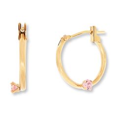 These round hoop earrings designed for a child feature pink cubic zirconia accents. Crafted of 14K yellow gold, the earrings secure with hinged backs. Pink Cubic Zirconia Huggie Earrings, Pink Cubic Zirconia Hoop Jewelry, Pink Cubic Zirconia Hoop Earrings, Pink Huggie Pierced Jewelry, Single Pink 14k Gold Earring, Pink Huggie Jewelry With Prong Setting, Pink Small Hoop Jewelry For Anniversary, Pink Hoop Huggie Earrings For Anniversary, Pink Huggie Hoop Earrings For Anniversary