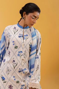 Brand: Sana SafinazProduct Code: H243-024A-3DBCollection: Mahay by Sana Safinaz Unstitched Winter CollectionFabric: Linen DESIGN DETAILS: Digital Printed Shirt Front On Linen 1.15 Meters Digital Printed Shirt Back On Linen 1.15 Meters Digital Printed Sleeves On Linen 0.65 Meters Embroidered Patti On Organza 1 Meter Rotary Printed Dupatta On Linen 2.5 Meters Rotary Printed Cambric Pants 1.75 Meters DISCLAIMER:* Lining, Laces, and Tassels are not included in unstitched variants.* Embellishment items in stitched outfits are subject to market availability.* Product color may vary due to photographic lighting or your device settings. CARE INSTRUCTIONS: Extra Fabric Has Been Used For Shoot Original Color May Vary Slightly From The Picture Dry Clean Recommended Iron The Clothes At Moderate Temper Chanderi Set With Printed Motifs And Long Sleeves, Silk Sets With Printed Motifs In Traditional Drape, Silk Palazzo Set With Chikankari Embroidery And Long Sleeves, Silk Long Sleeve Palazzo Set With Chikankari Embroidery, Silk Unstitched Long Sleeve Suit For Transitional Season, Elegant Printed Kurta For Diwali, Designer Long Sleeve Cambric Palazzo Set, Transitional Long Sleeve Silk Lawn Suit, Festive Long Sleeve Cambric Palazzo Set