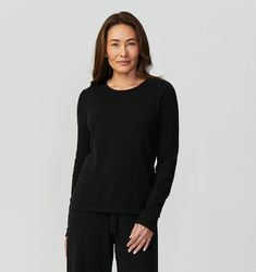 Sferra Intimita Cashmere Black Long Sleeve Top proves that relishing in the comfort of home is best enjoyed in the comfort of pure cashmere, with velvety soft loungewear long sleeve top that turn days of rest and relaxation into truly sublime rituals. Fabrication Yarn-dyed single ply knit Fiber 100% Cashmere Finishing Neck: 3/8-inch rib binding Sleeve and Bottom Sweep Hem: 7/8-inch turn back Hem Plain hem Origin China Long Sleeve Cashmere Sweater For Loungewear, Cashmere Tops With Ribbed Cuffs For Loungewear, Solid Cashmere Sweater For Loungewear, Cozy Cashmere Tops For Loungewear, Elegant Long Sleeve Tops For Lounging, Monogram Bedding, Grandmillenial Style, Childrens Rugs, Rest And Relaxation