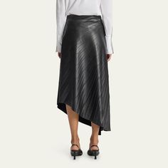 A.L.C. "Tracy" pleated side-ruched maxi skirt in faux leather Mid-rise A-line silhouette Asymmetric hem  Pull-on style Viscose/polyurethane/elastane Nylon lining Dry clean Imported Pleated Asymmetrical Fitted Skirt, Fitted Leather Pleated Skirt, Chic Asymmetrical Pleated Bottoms, Elegant Pleated Asymmetrical Bottoms, Elegant Asymmetrical Pleated Bottoms, Asymmetrical Pleated Skirt Bottoms For Evening, Leather Pleated Skirt For Night Out, Chic Pleated Leather Bottoms, Evening Bottoms With Pleated Asymmetrical Skirt