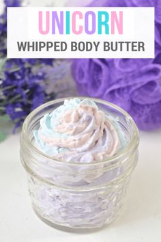 unicorn whipped body butter in a glass jar with flowers behind it and text overlay that reads, unicorn whipped body butter