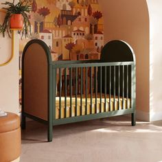 a baby crib in the corner of a room