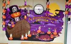 a classroom decorated for halloween with pumpkins and decorations