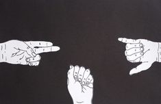 three hands pointing at each other in the same direction