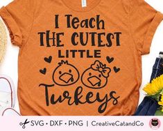 an orange shirt that says i teach the cutest little turkeys