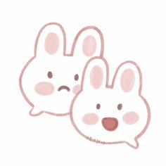 two cute little bunnies with faces drawn on them