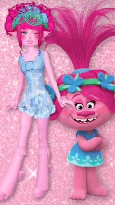 a pink troll and a girl in blue dress standing next to each other on a pink background