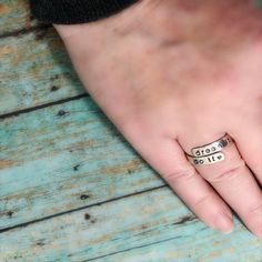 Does the phrase ''faith hope love'' bring peace and meaning to your heart? Faith, hope, ''love'' or cross is hand stamped on wrap ring in your choice of metal. I personally love to wear this ring on my middle finger, thumb, and pinky. It is adjustable so you may be able to squeeze it or stretch it a little for various fingers. These make great gifts since they are adjustable. QUANTITY This listing is for one item unless you choose more. FEATURES 4mm wide .925 sterling silver, 14K rose gold fille Inspirational Adjustable Hand Stamped Rings, Inspirational Adjustable Silver Rings, Inspirational Adjustable Ring, Inspirational Adjustable Sterling Silver Rings, Inspirational Hand Stamped Silver Rings, Adjustable Inspirational Sterling Silver Rings, Personalized Inspirational Ring Jewelry, Inspirational Personalized Ring Jewelry, Adjustable Inspirational Stamped Rings